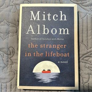 **The Stranger in the Lifeboat** by Mitch Albom